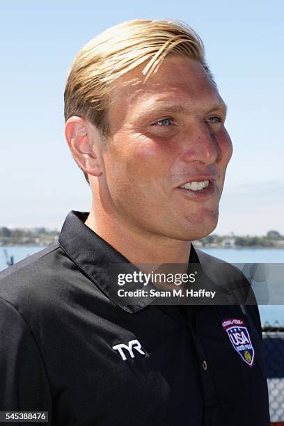 Jesse Smith of Team USA speaks with the media during the USA Men's Olympic Water Polo Team announcement onboard the USS Midway on July 7, 2016 in San...