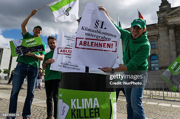 Activists of the association for the environment and nature conservancy protest under the motto 'climate killer law...chuck it in the dustbin' in...