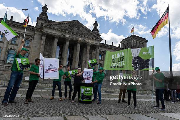 Activists of the association for the environment and nature conservancy protest under the motto 'climate killer law...chuck it in the dustbin' in...