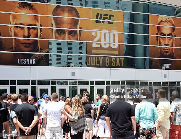 Banner featuring fighters for UFC 200 at T-Mobile Arena shows half of an image of mixed martial artist Daniel Cormier and a blank space where an...