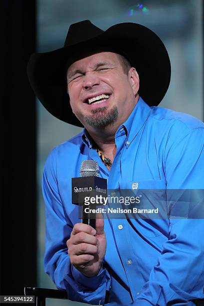 Garth Brooks chats with an intimate audience on stage as part of the AOL Build Speaker Series at AOL Studios In New York on July 7, 2016 in New York...