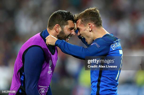 Antoine Griezmann of France celebrates scoring his team's second goal with his team mate Andre-Pierre Gignac during the UEFA EURO semi final match...