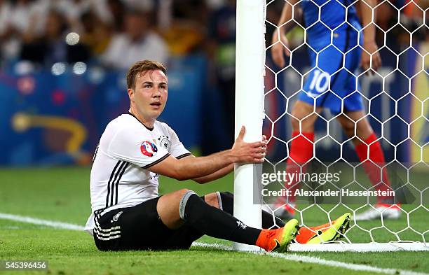 Mario Goetze of Germany reacts as he sits on the turf during the UEFA EURO semi final match between Germany and France at Stade Velodrome on July 7,...