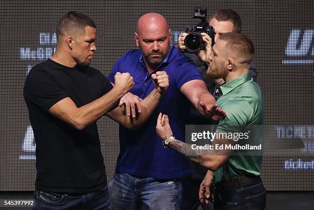 Nate Diaz and Conor McGregor face off at the UFC 202 press conference at the T-Mobile Arena on July 7, 2016 in Las Vegas, Nevada.