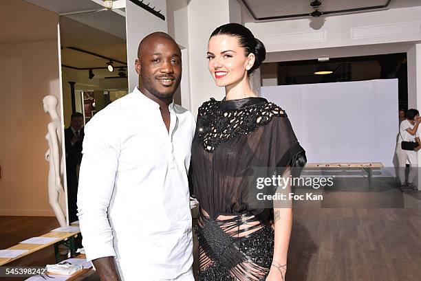 Julie Camara and rugbyman Djibril Camara attend the Dany Atrache Haute Couture Fall/Winter 2016-2017 show as part of Paris Fashion Week on July 4,...