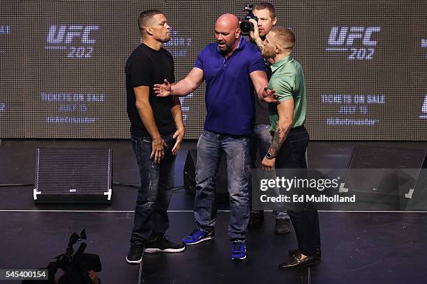 Nate Diaz and Conor McGregor face off at the UFC 202 press conference at the T-Mobile Arena on July 7, 2016 in Las Vegas, Nevada.