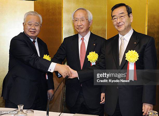 Japan - Hiromasa Yonekura , chairman of the Japan Business Federation known as Nippon Keidanren, Tadashi Okamura , chairman of the Japan Chamber of...