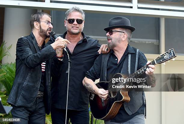 Musician Ringo Starr, singer Jon Stevens and musician Dave Stewart perform at Ringo Starr's "Peace & Love" birthday celebration at Capitol Records on...