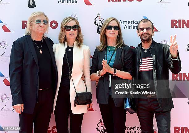 Musician Joe Walsh, his wife Marjorie Bach, her sister Barbara Bach and her husband musician Ringo Starr pose at Ringo Starr's "Peace & Love"...