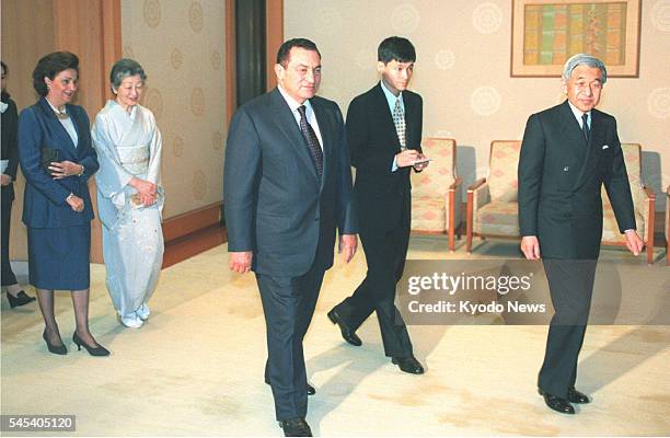 Japan - In this April 1999 file photo, Japanese Emperor Akihito , and his wife, Empress Michiko , welcome Egyptian President Hosni Mubarak and his...
