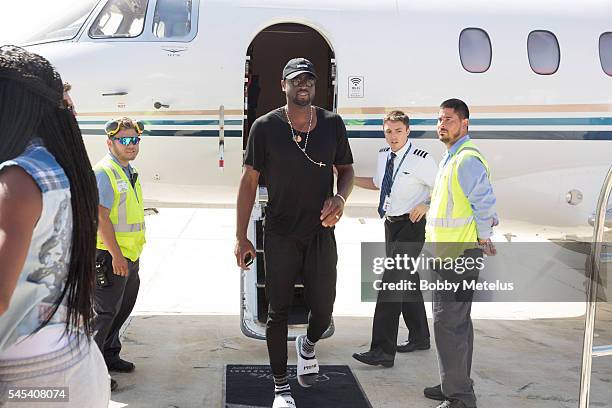 Dwyane Wade arrives in Miami after his decision to leave the Miami Heat at Opa-Locka Executive Airport on July 7, 2016 in Miami, Florida.