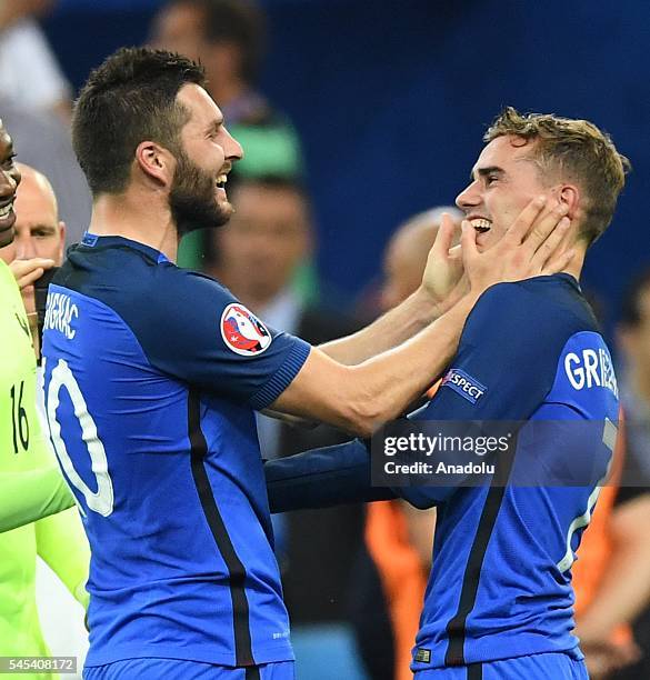 Antoine Griezmann and Andre-Pierre Gignac of France celebrate their victory over Germany after the UEFA Euro 2016 semi final match between Germany...