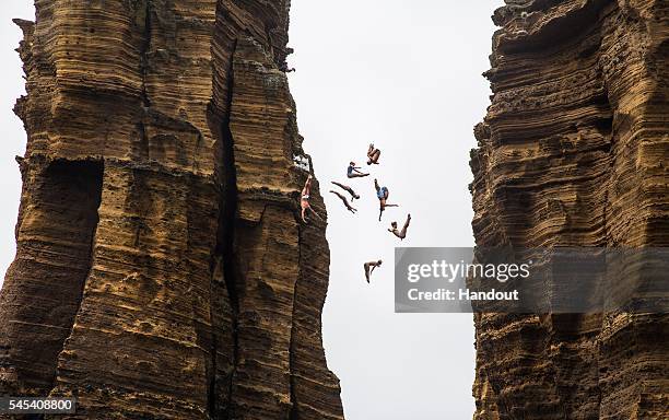 In this handout image provided by Red Bull, Nine divers, Todor Spazov of Bulgaria, Gary Hunt of the UK, Kyle Mitrione of the USA, Helena Merten of...