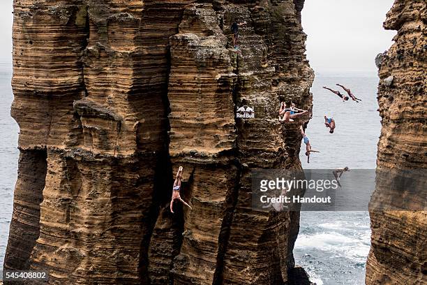In this handout image provided by Red Bull, Nine divers Todor Spazov of Bulgaria, Gary Hunt of the UK, Kyle Mitrione of the USA, Helena Merten of...