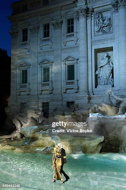 Designer Silvia Venturini Fendi and designer Karl Lagerfeld acknowledge the applause of the audience at the runway at Fendi Roma 90 Years Anniversary...