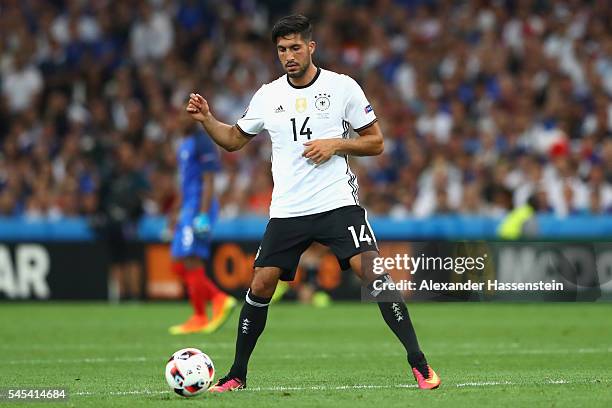 Emre Can of Germany runs with the ball during the UEFA EURO 2016 semi final match between Germany and France at Stade Velodrome on July 7, 2016 in...