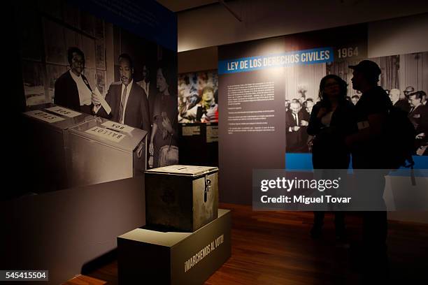 People visit the exhibition of Martin Luther King Jr. "A dream of equality" at the Museo Memoria y Tolerancia on July 07, 2016 in Mexico City,...