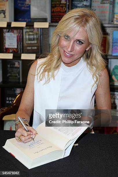 Author Emily Giffin attends the book signing for "First Comes Love" at Barnes & Noble on July 7, 2016 in Huntington Beach, California.