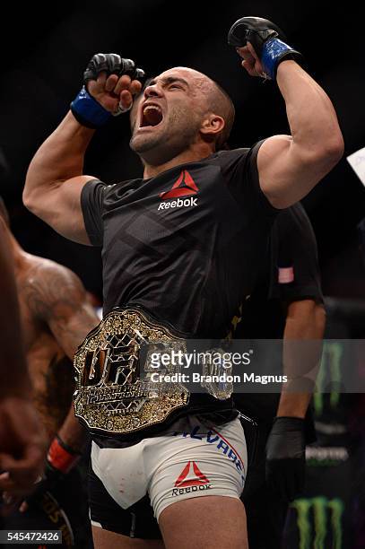 Eddie Alvarez celebrates after defeating Rafael Dos Anjos of Brazil in their lightweight championship bout during the UFC Fight Night event inside...