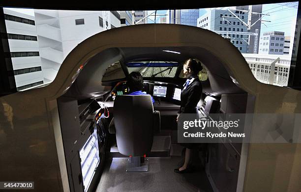 Japan - A life-size driving simulator for the N700 series shinkansen bullet train at the SC MAGLEV and Railway Park in Nagoya is unveiled to the...