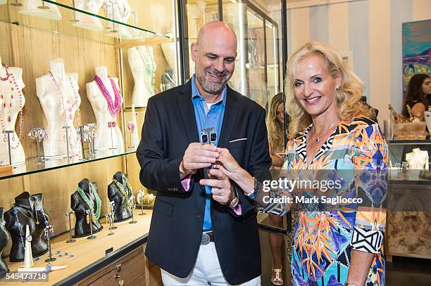 Artist Glenn Bradford and Sports commentator Ann Liguori attend the Glenn Bradford Fine Jewelry Instore Event at Glenn Bradford on July 7, 2016 in...