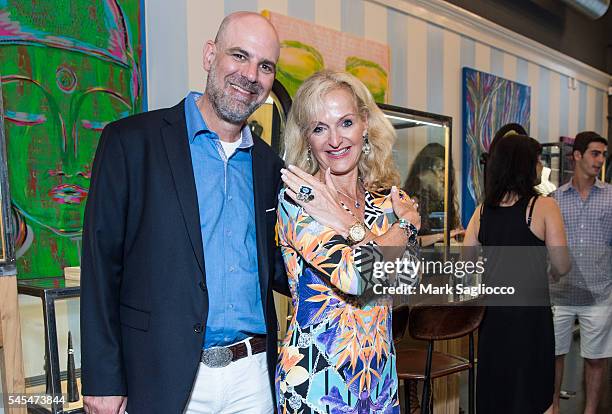 Artist Glenn Bradford and Sports commentator Ann Liguori attend the Glenn Bradford Fine Jewelry Instore Event at Glenn Bradford on July 7, 2016 in...