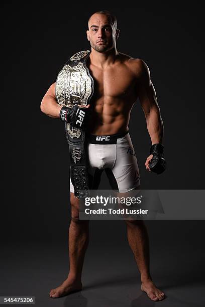 Newly crowned UFC lightweight champion Eddie Alvarez poses for a portrait backstage after his victory over Rafael Dos Anjos of Brazil during the UFC...