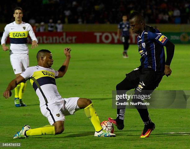 Independent del Valle, Julio Angulo and Fernando Zuqui of Boca Junior fight the ball on the first leg semifinals of Copa Libertadores de America...