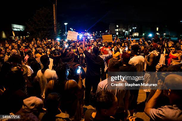 Protestors gather at the intersection where Philando Castile was shot on July 7, 2016 in Falcon Heights, Minnesota. Castile was shot and killed by a...