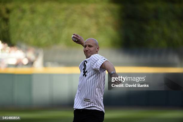 United States National Soccer Team goalie Brad Guzan throw out the ceremonial first pitch before a game between the Chicago White Sox and the New...