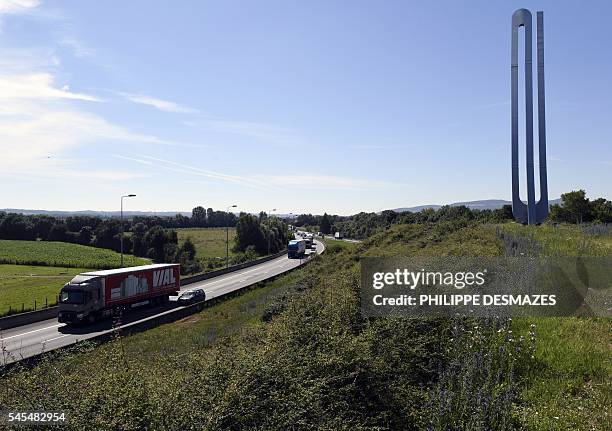 This picture taken on July 7, 2016 shows "Signe infini" , a 1993 monumental sculpture by French artist Marta Pan, located at the junction of A6 and...