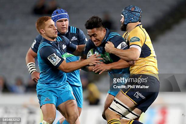 Male Sa'u of the Blues is tackled during the round 16 Super Rugby match between the Blues and the Brumbies at Eden Park on July 8, 2016 in Auckland,...