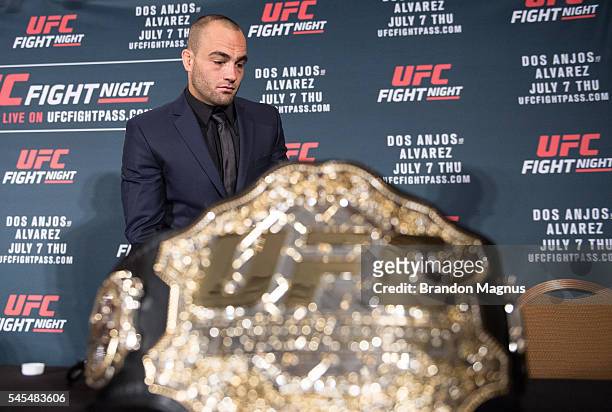 Eddie Alvarez picks up his belt after defeating Rafael Dos Anjos of Brazil in their lightweight championship bout during the UFC Fight Night event...