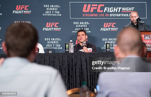 Rafael Dos Anjos of Brazil speaks to the media at the post fight press conference inside the MGM Grand Garden Arena on July 8, 2016 in Las Vegas,...