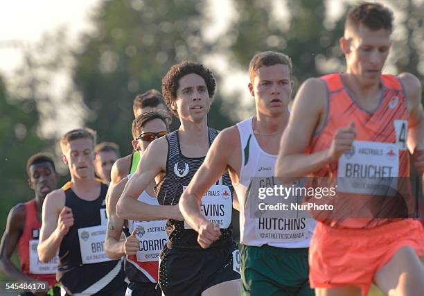 In the center, Cameron Levins from Nike UNBC controles the race during the early 5000 metres final, at the opening day of the 2016 Canadian Track...