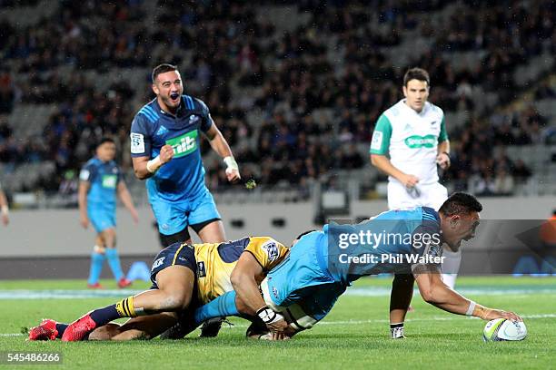 Jerome Kaino of the Blues scores a try during the round 16 Super Rugby match between the Blues and the Brumbies at Eden Park on July 8, 2016 in...