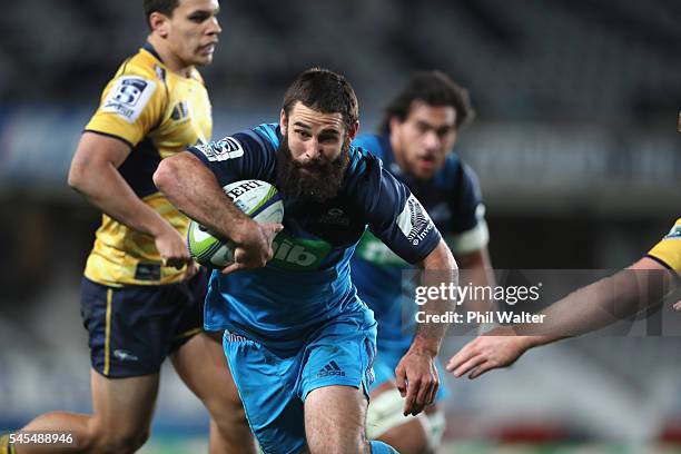 Billy Guyton of the Blues makes a break during the round 16 Super Rugby match between the Blues and the Brumbies at Eden Park on July 8, 2016 in...