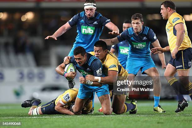 Melani Nanai of the Blues is tackled during the round 16 Super Rugby match between the Blues and the Brumbies at Eden Park on July 8, 2016 in...