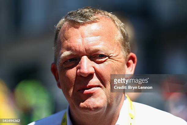 Danish Prime Minister Lars Lokke Rasmussen attends the start of stage six of the 2016 Tour de France, a 190km road stage from Arpajon-sur-cere to...