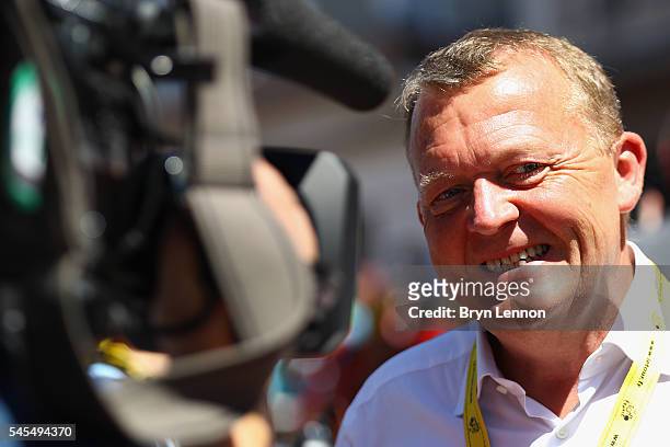 Danish Prime Minister Lars Lokke Rasmussen attends the start of stage six of the 2016 Tour de France, a 190km road stage from Arpajon-sur-cere to...