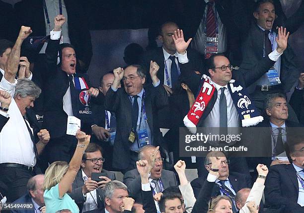 French Prime Minister Manuel Valls, President of French Football Federation Noel Le Graet, President of France Francois Hollande celebrate the first...