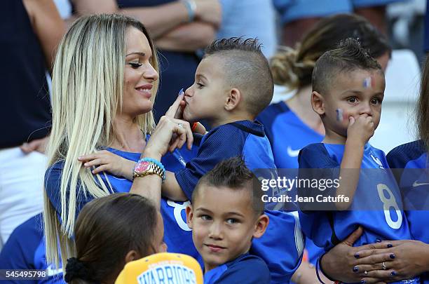 Ludivine Payet, wife of Dimitri Payet and their sons Milan Payet and Noa Payet attend the UEFA Euro 2016 semi-final match between Germany and France...