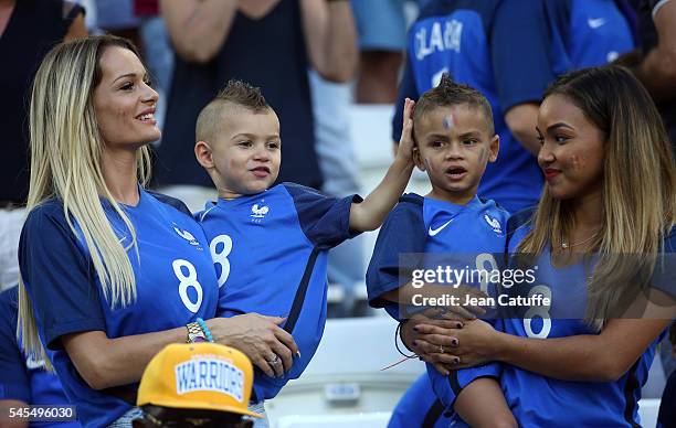 Ludivine Payet, wife of Dimitri Payet and their sons Milan Payet and Noa Payet attend the UEFA Euro 2016 semi-final match between Germany and France...