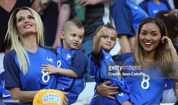 Ludivine Payet, wife of Dimitri Payet and their sons Milan Payet and Noa Payet attend the UEFA Euro 2016 semi-final match between Germany and France...
