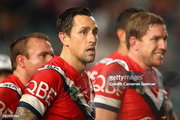 Mitchell Pearce of the Roosters and team mates look dejected after an Eels try during the round 18 NRL match between the Parramatta Eels and the...
