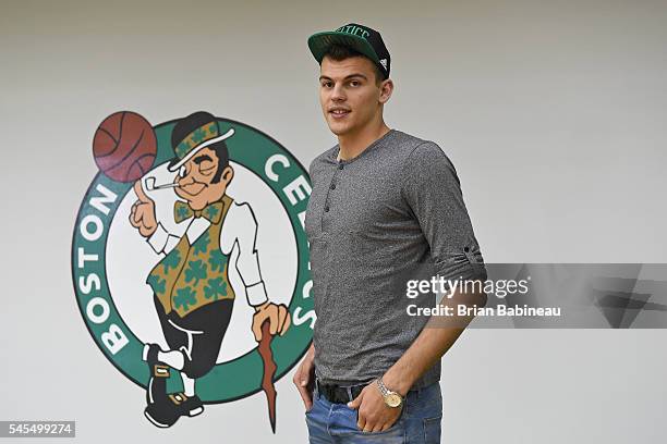 Ante Zizic poses for a portrait after being drafted by the Boston Celtics during the 2016 NBA Draft on June 24, 2016 at TD Garden in Boston,...