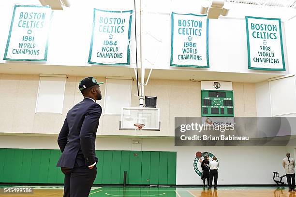 Jaylen Brown looks up at the banners at the practice facility after being drafted by the Boston Celtics during the 2016 NBA Draft on June 24, 2016 at...