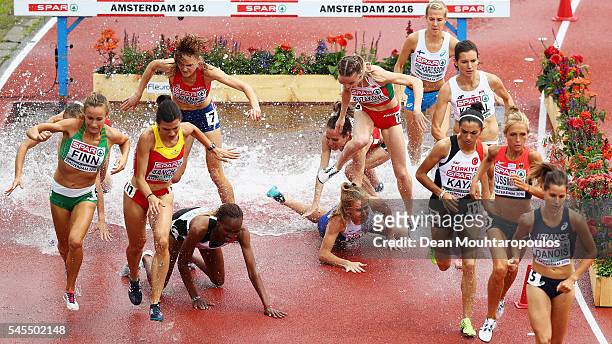 Lennie Waite of Great Britain falls during the qualifying for the womens 3000m steeplechase on day three of The 23rd European Athletics Championships...