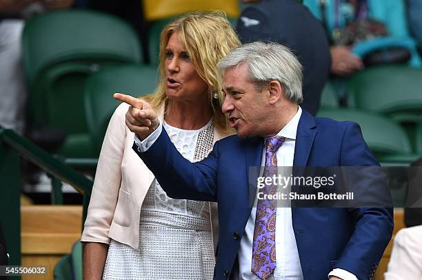 Rt Hon John Bercow and Sally Bercow watch on as Roger Federer of Switzerland plays Milos Raonic of Canada in the Men's Singles Semi Final match on...