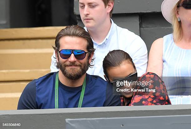 Bradley Cooper and Irina Shayk attend day eleven of the Wimbledon Tennis Championships at Wimbledon on July 08, 2016 in London, England.
